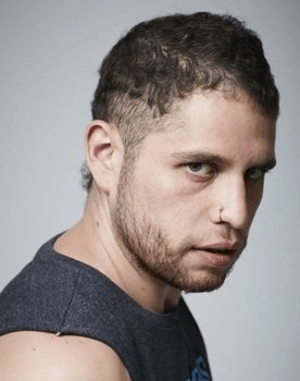 Luis Guzmán as Julián
