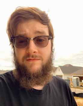 Evan Jordan as Tal Burger Spokesman