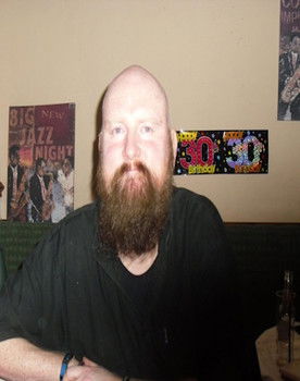 Paul Schofield as Face of Society