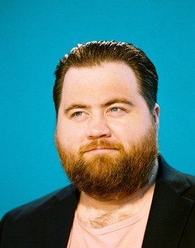 Paul Walter Hauser as Simon