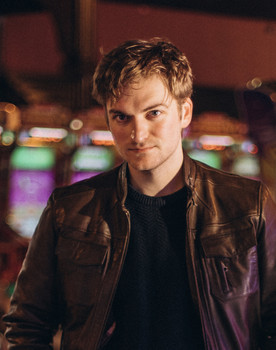 Ryan J. Smith as News Reporter