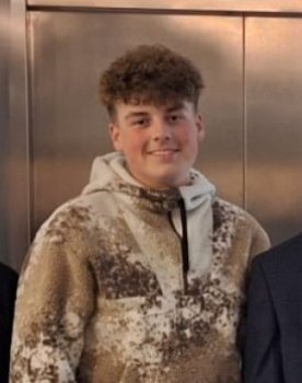 Jamie Gallacher as Iain Wainwright (Young)