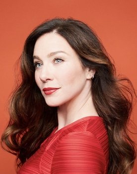 Lynn Collins as Mona