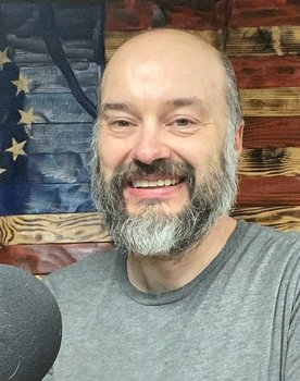 Josh Cobbs as Podcast Host