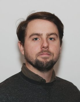 Brendan Brady as Checkout Clerk