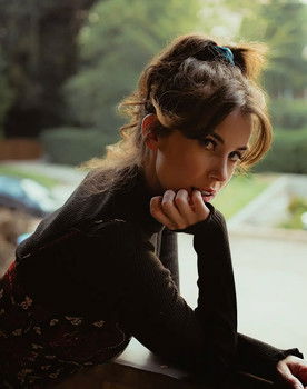 Claudia Burns as The Lady in Red