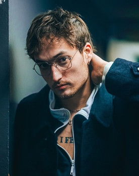 Julien Peultier as Self : Interviewer (voice over)