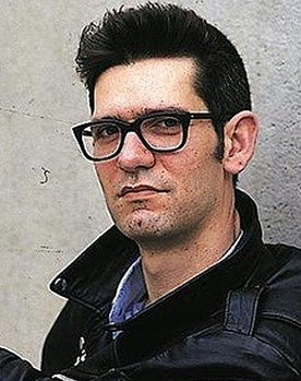 Carlos García Berlanga as Archive