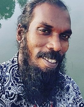 Sooraj Pops as Mugil Anna