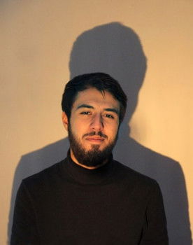 Aram Khachatryan as Beggar