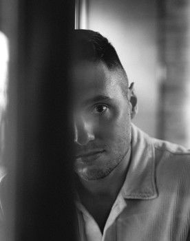 Manny Gumina as The Host