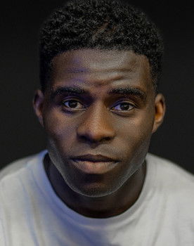 Kenneth Omole as Jazz Club Compare