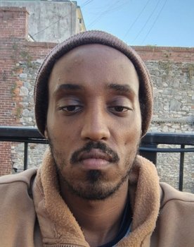 Mohamed Ali Farah as Nadia's Brother