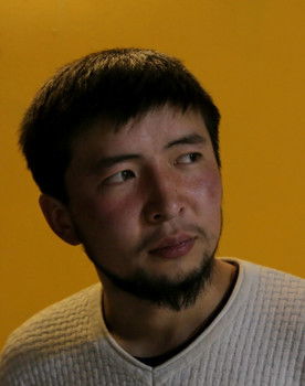 Aitaly Kochkorov as Director with the mask