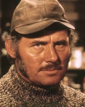 Robert Shaw as Aston