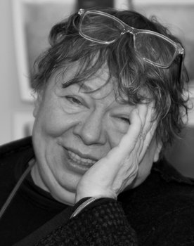 Libuše Jarcovjáková as Self - Photographer / Narrator (voice)