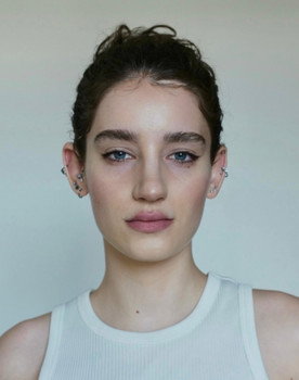 Ema Kosac as The Hostess