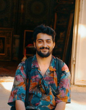 Ahmet Tikici as The Agent