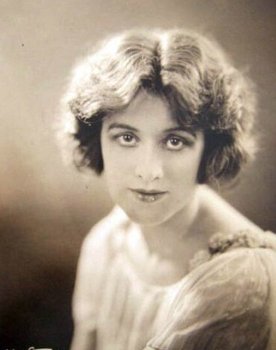 Regina Wallace as Hostess