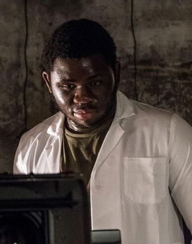 Charles Mugoya as Adisa