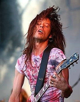 Jamie Law as Guitars