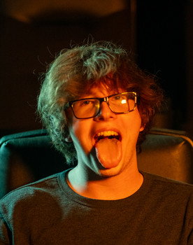 Alexander Hatt as Off Screen Voice #2