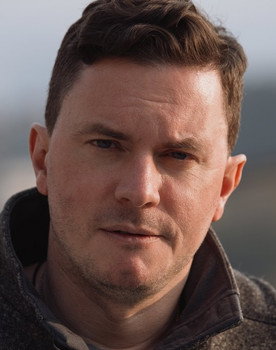 Jason Lane Cutler as American HR Manager