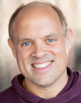 Jim Woods as Coach Ulysses