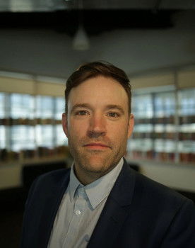 Chris Mitchell as Security guard