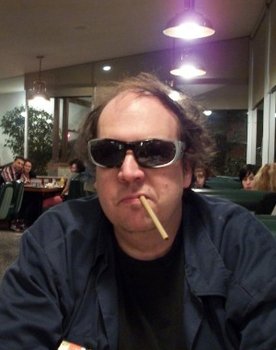 Damon Packard as L. Ron Hubbard