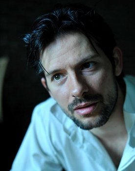 Gábor Hellebrandt as Filmmaker Radnai