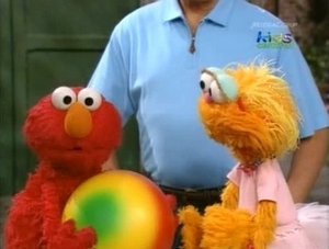 Backdrop image for Elmo and Zoe Claim a Ball