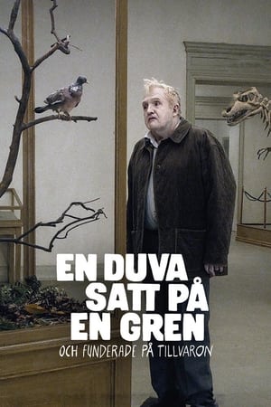 Image En duva satt på en gren och funderade på tillvaron