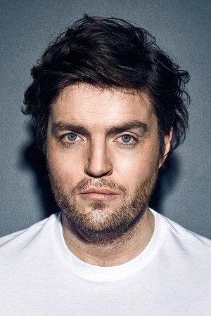 Foto retrato de Tom Burke