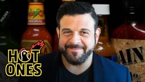 Image Adam Richman Impersonates Noel Gallagher While Eating Spicy Wings