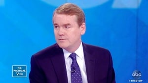 Image Michael Bennet and Katie Couric