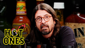 Image Dave Grohl Makes a New Friend While Eating Spicy Wings