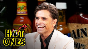 Hot Ones John Stamos Falls Out of His Chair While Eating Spicy Wings