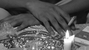 between tea and the ashtray