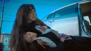 The Woman in the White Car