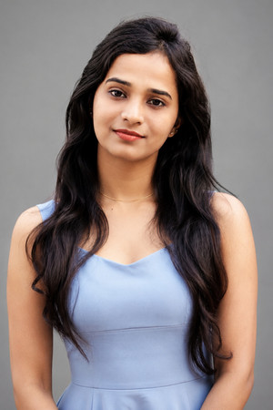 Pooja J — interprète de Contestant