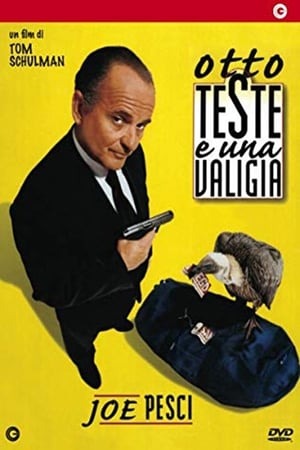 Image Otto teste e una valigia