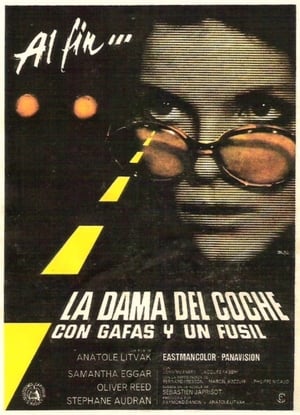 La dama del coche con gafas y un fusil