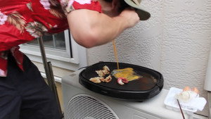 PINK GUY COOKS TAKOYAKI AND RAPS