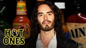 Hot Ones Russell Brand Serenades Superfan Brett Baker While Eating Spicy Wings