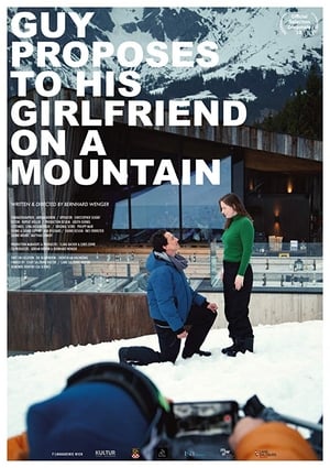 Image Guy Proposes To His Girlfriend On A Mountain