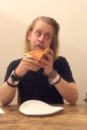 Macaulay Culkin Eating a Slice of Pizza 2013