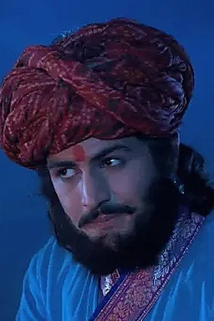 An officer imprisons Jalal