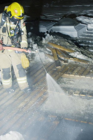 Fire on an Apartment Building Roof