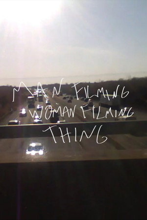Man Filming Woman Filming Thing